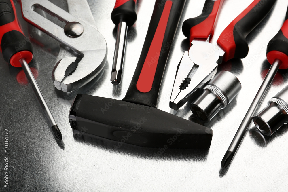 Different kinds of tools on dark background Different kinds of tools on dark background