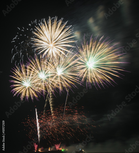 Fireworks light up the sky from boat