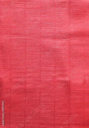 Red cloth texture with uneven surface