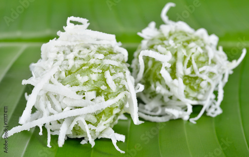 Thai dessert, sweet boiled ball dessert with shredded coconut on photo