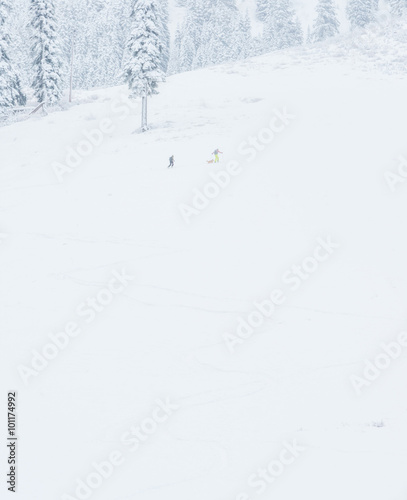 Wallpaper Mural scenic view of small people walking in snow mountain. Torontodigital.ca
