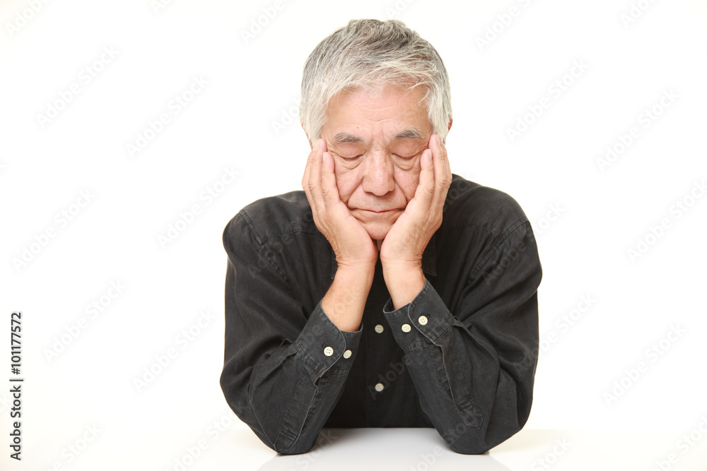 senior Japanese man sleeping on the table senior Japanese man sleeping on the table