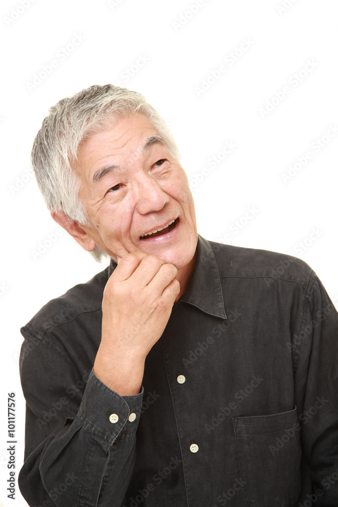 senior Japanese man dreaming at his future senior Japanese man dreaming at his future