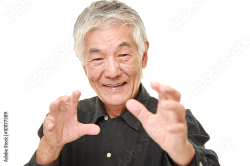 senior Japanese man with supernatural power photo