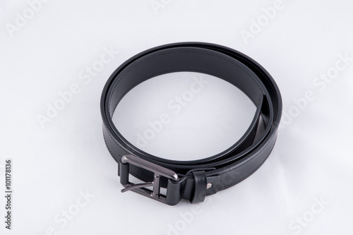 Black leather belt isolated on white background