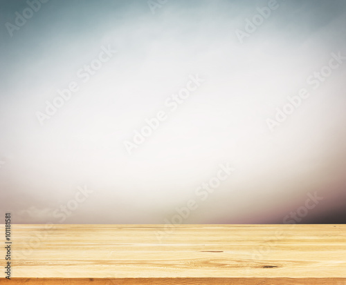Wood table top on summer sky background - can be used for displa