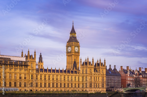 The Big Ben, the Houses of Parliament and Westminster Bridge at sunrise with beautiful sky - London, UK 
