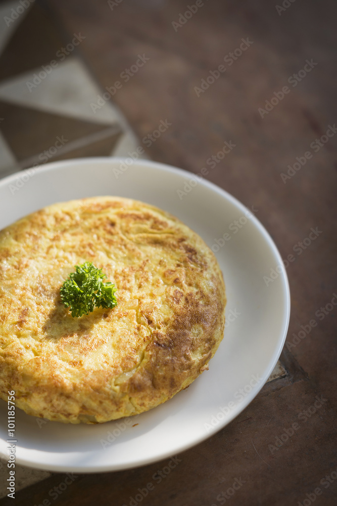spanish tortilla traditional omelet on rustic tiles