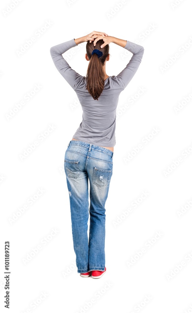 back view of standing young beautiful brunette woman. back view of standing young beautiful brunette woman.