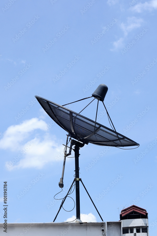Satellite dish on top of building Satellite dish on top of building