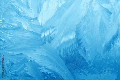 Frost patterns on window glass in winter. Frosted Glass Texture. Blue