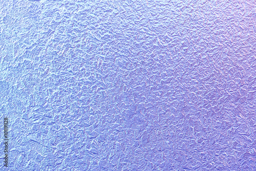 Frost patterns on window glass in winter. Frosted Glass Texture. Blue Purple