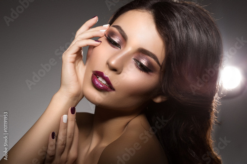 Beautiful model woman in beauty salon makeup Young modern girl i