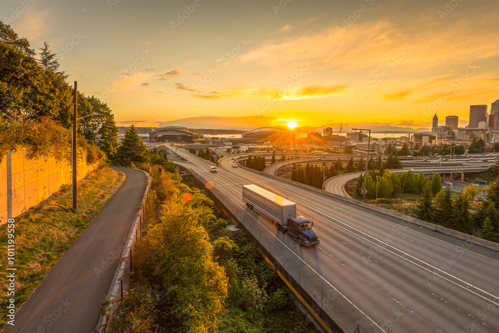 scene of Seattle skylines and Interstate freeways in the sunset. scene of Seattle skylines and Interstate freeways in the sunset.