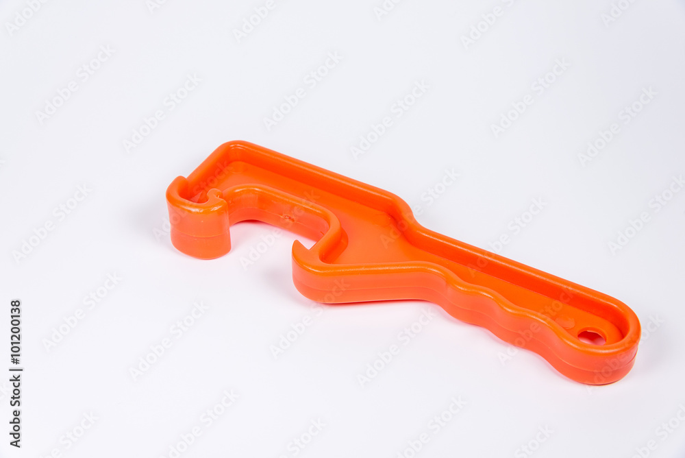 orrange plastic pail opener on white background.-bucket opener. orrange plastic pail opener on white background.-bucket opener.
