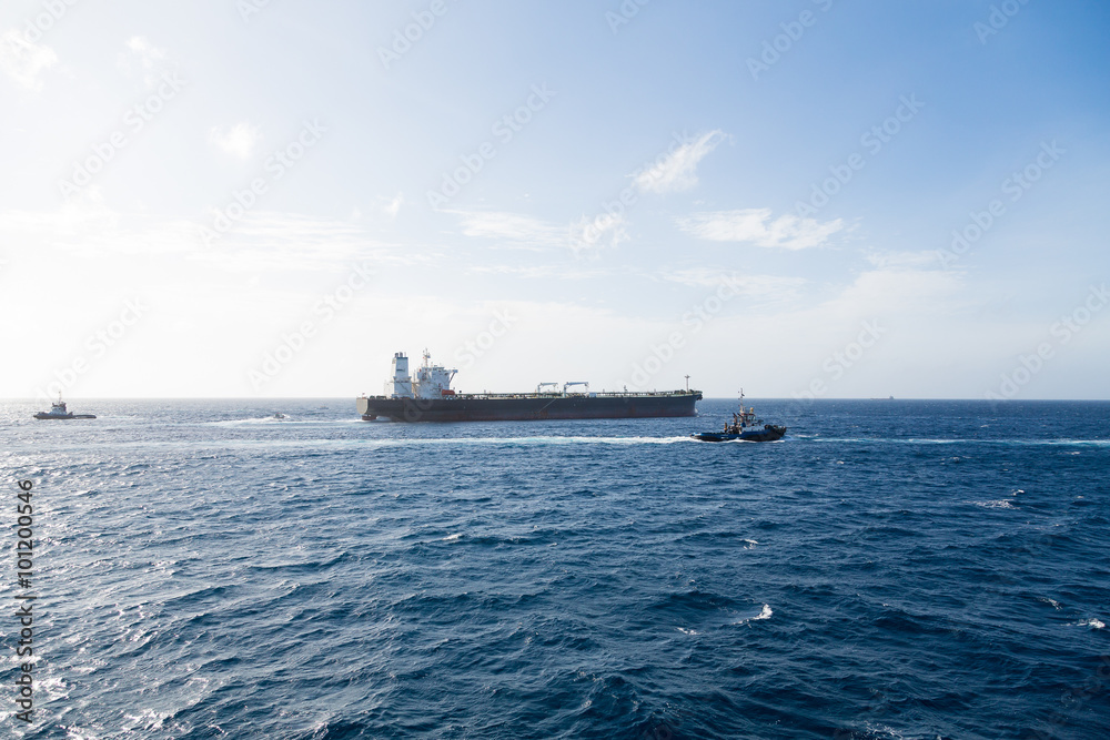 Tanker and Tugs on Horizon