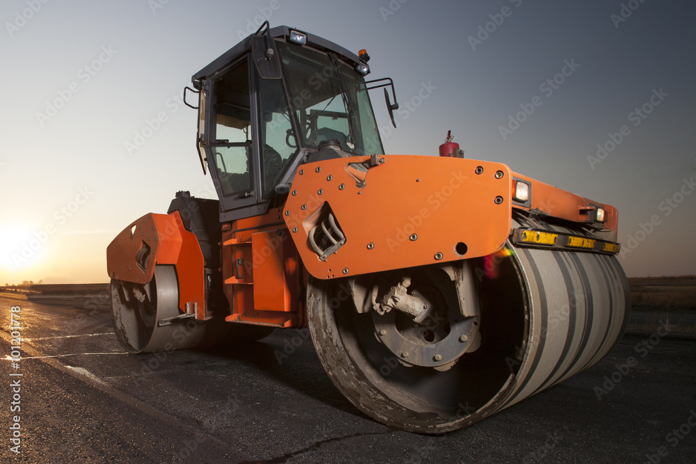clean image of a compact roller with sunset sky