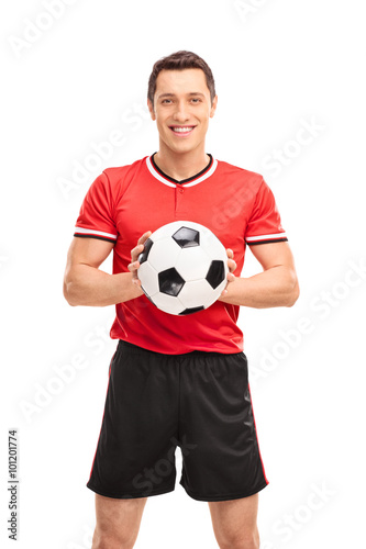 Young football player holding a ball © Ljupco Smokovski