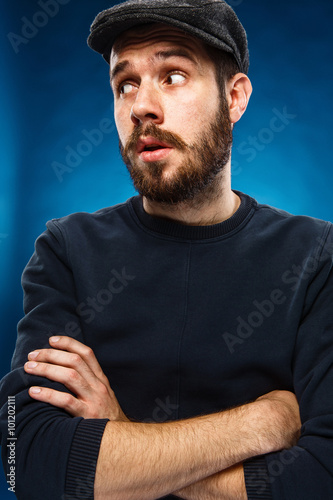 The young man's face with eyes looking sideway