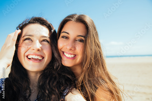 Funny selfie girls on the beach