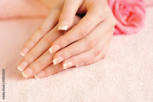 Closeup image of pink french manicure