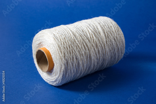 White thread isolated on white background. Rope, wool, knitting homemade handmade object.