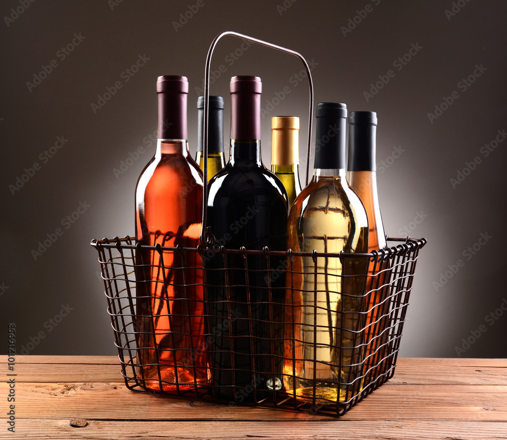 A Wire Shopping Basket Filled With Wine Bottles A Wire Shopping Basket Filled With Wine Bottles