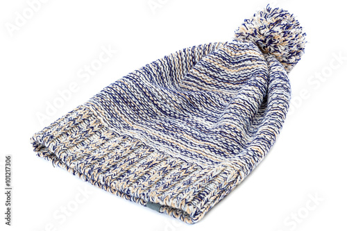 Winter colorful knitted cap on a white