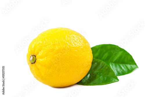 Lemon with green leaves on white background.