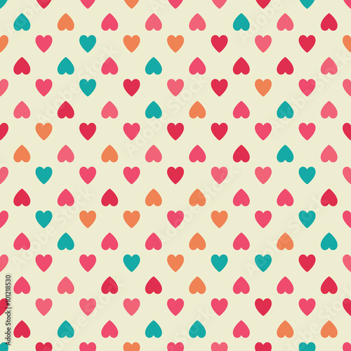 Seamless pattern background with colorful hearts.