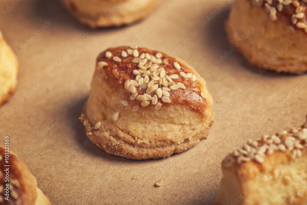 Fresh homemade salty scones with cheese and sesame Fresh homemade salty scones with cheese and sesame