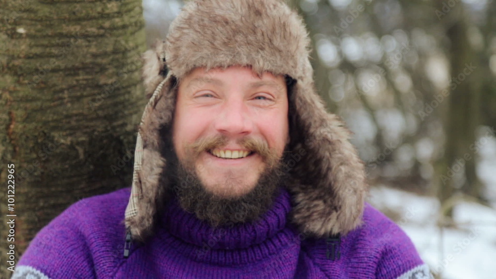 Emotional bearded man looking into the camera, swearing, smoking, laughing. The face of a bearded emotional man in winter.
Emotional bearded man looking into the camera, swearing, smoking, laughing. The face of a bearded emotional man in winter.