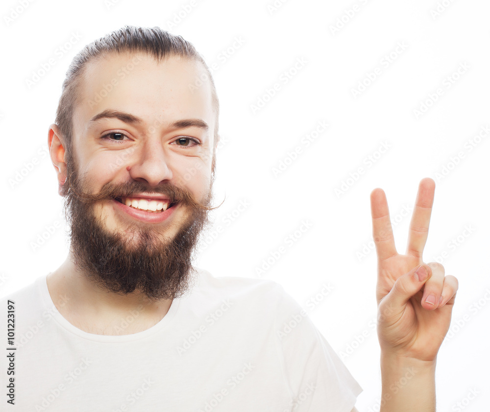 young bearded man with good idea sign. young bearded man with good idea sign.