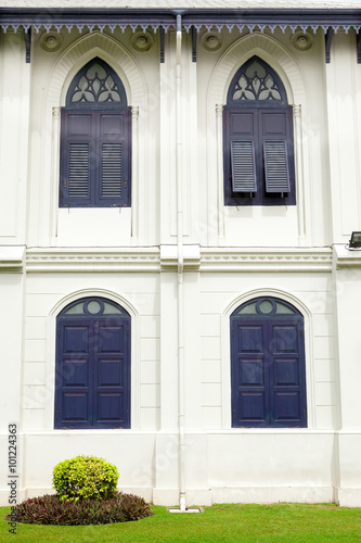 The blue window on the white wall