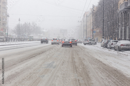 snow-covered streets of the city during a storm
