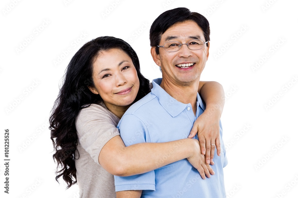 Smiling couple holding each other Smiling couple holding each other
