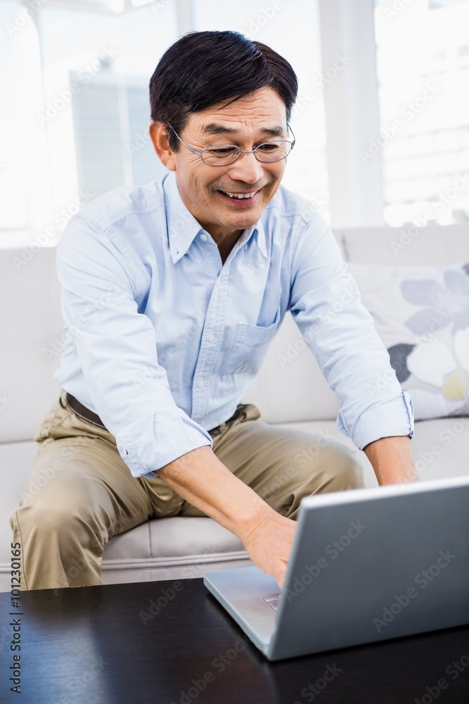 Happy man sitting at home Happy man sitting at home