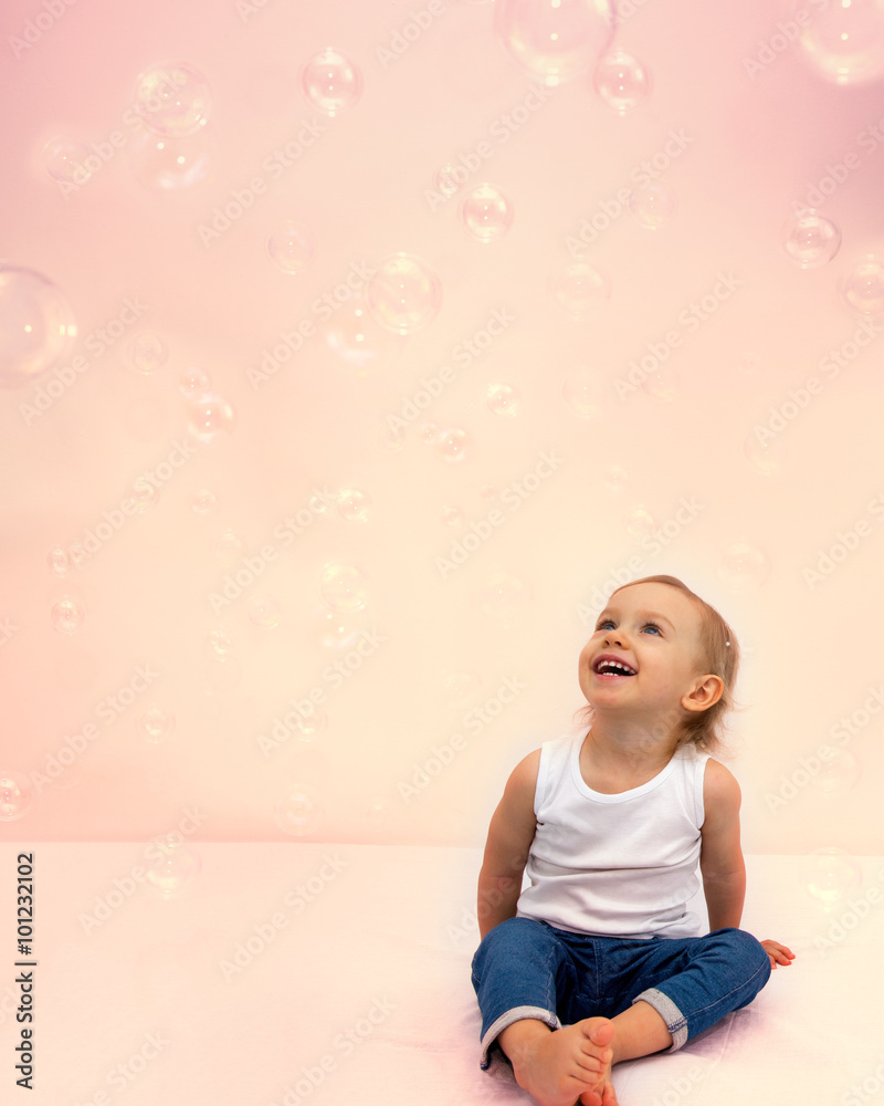 Two year old girl has a fun soap bubbles. Two year old girl has a fun soap bubbles.
