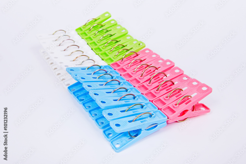 Lots of clothespins on a white background Lots of clothespins on a white background