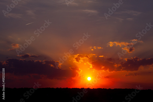 summer sunset in the field. a hot evening.