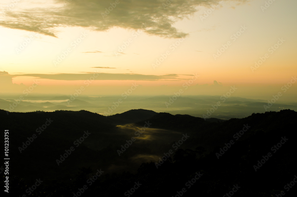 art tone,blurry,silhouette of sunset in the mountain