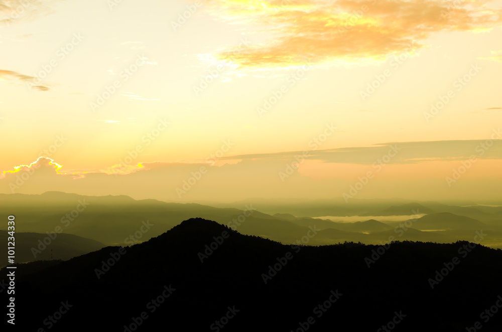 art tone,blurry,silhouette of sunset in the mountain