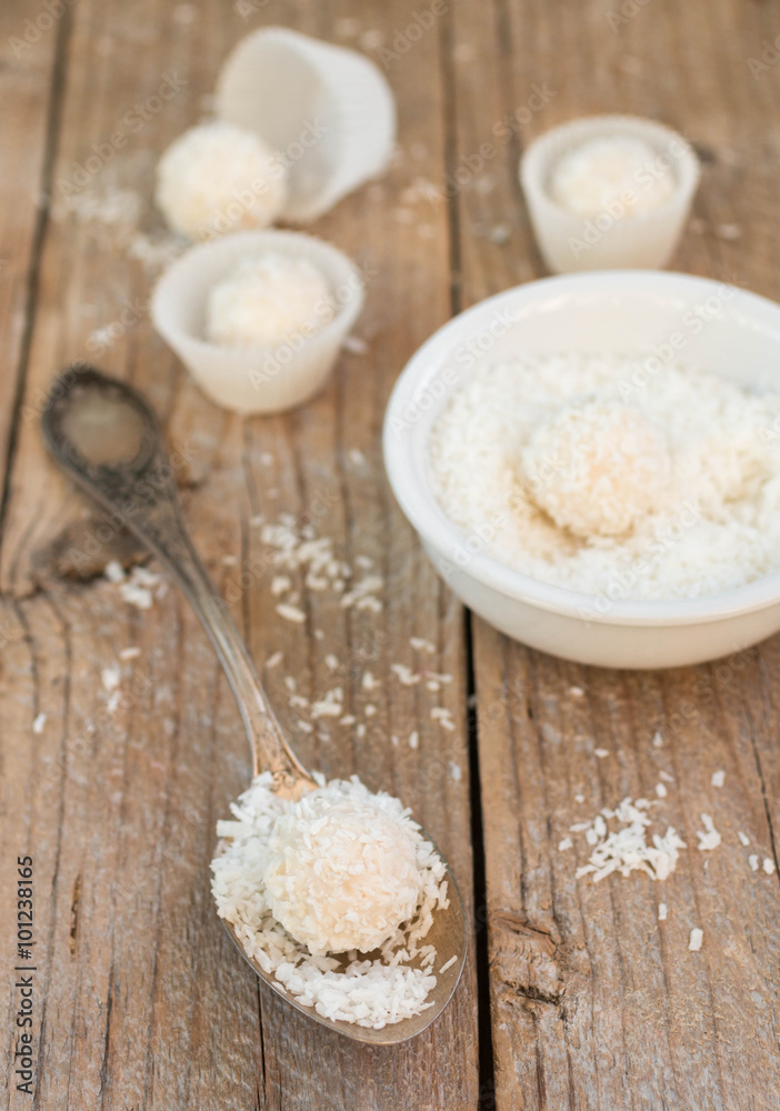 Making truffles white chocolate with coconut. Homemade candy Making truffles white chocolate with coconut. Homemade candy