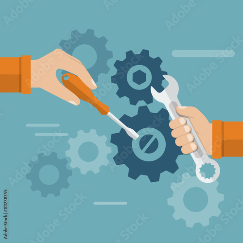 Teamwork. Hands team with a tool to repair mechanism