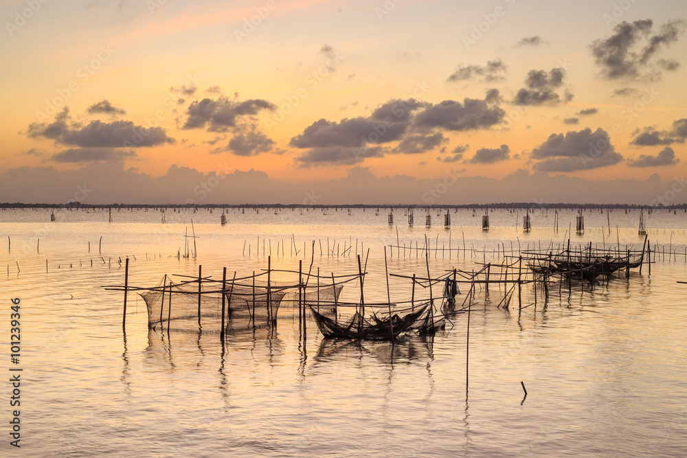 Twilight The bamboo coop for feeding fish. in south of Thailand sea. Songkhla, Koh-Yor