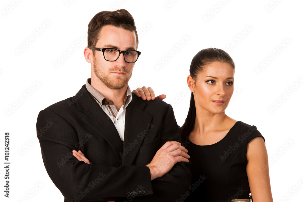 Confident business couple standing next to each other. Woman lea Confident business couple standing next to each other. Woman lea