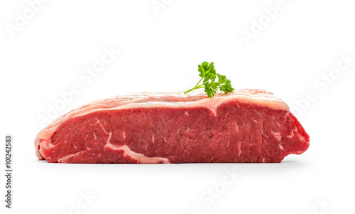 Raw rump steak with parsley twig