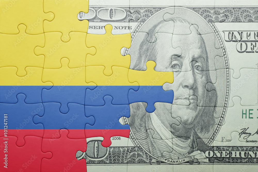 puzzle with the national flag of colombia and dollar banknote