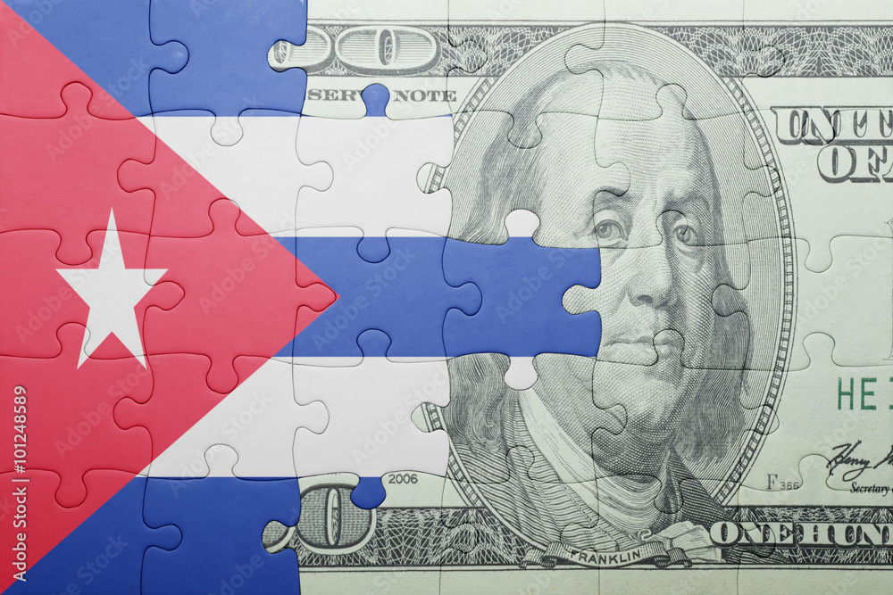 Naklejka premium puzzle with the national flag of cuba and dollar banknote