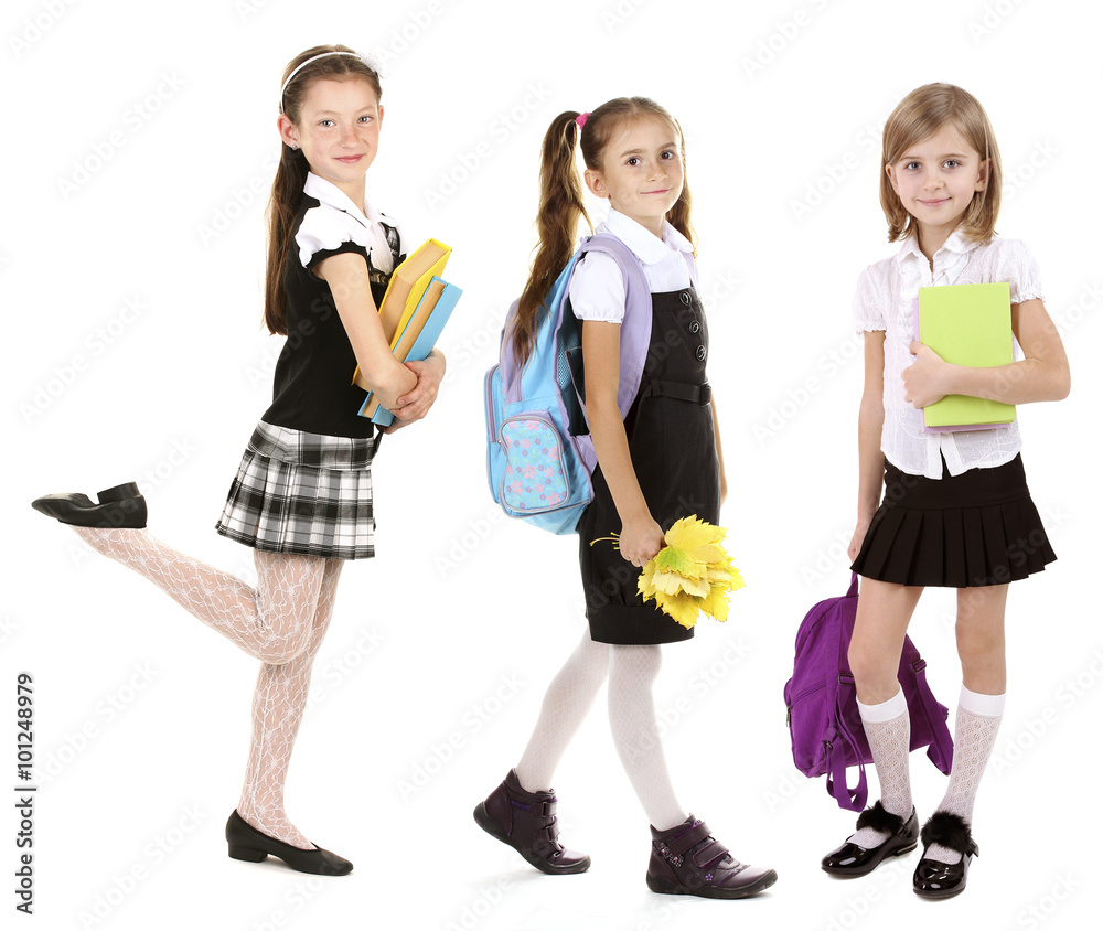 Fototapeta premium Cute happy schoolgirls, isolated on white